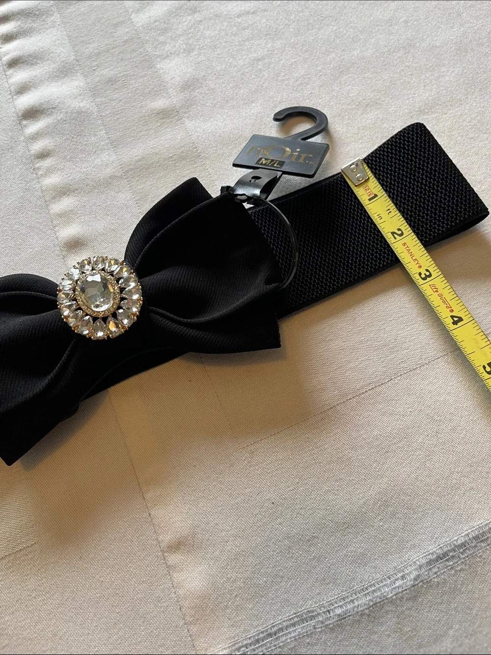 NWT nOir Jewelry Black Bow Elastic Waist Belt with Crystal Medallion Size M/L